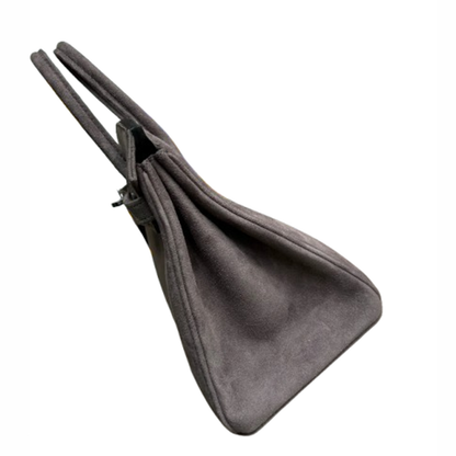 Muted Ash Grey Matte Fuzzy Compact Trapezoid Hand Tote With Sleek Cool Silvery Twist Lock Hardware And Unified Tone Precision Edge Stitching