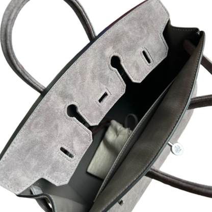 Muted Ash Grey Matte Fuzzy Compact Trapezoid Hand Tote With Sleek Cool Silvery Twist Lock Hardware And Unified Tone Precision Edge Stitching