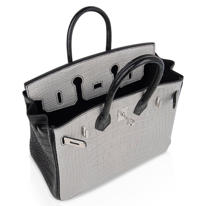 Pale Ash Grey Jet Black Contrast Scaled Compact Trapezoid Hand Tote With Cool Polished Silvery Twist Lock Hardware And Matching Textured Suspended Padlock Charm